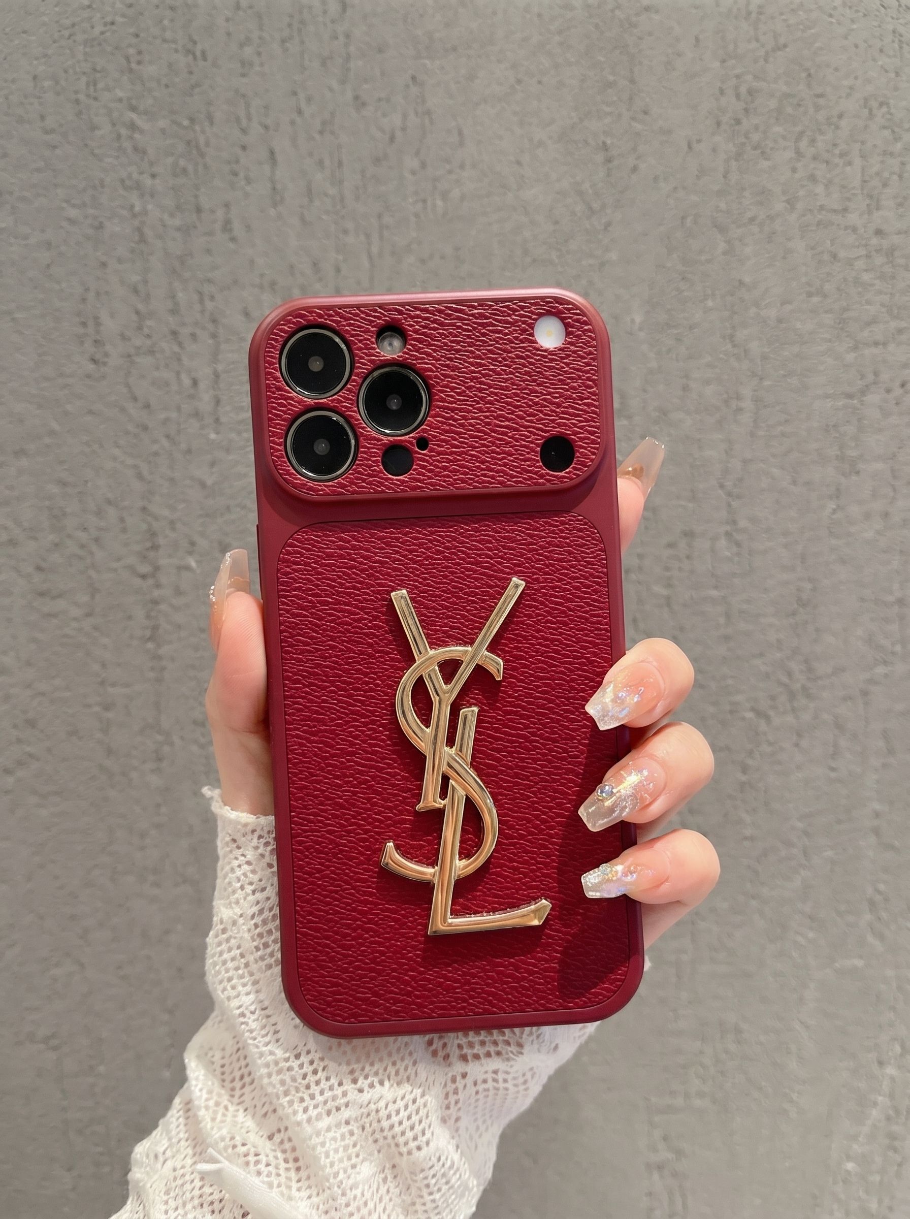 Ốp Lưng Iphone Da Cao Cấp Phối Logo YSL Kim Loại – Tuyệt Tác Của Sự Thượng Lưu