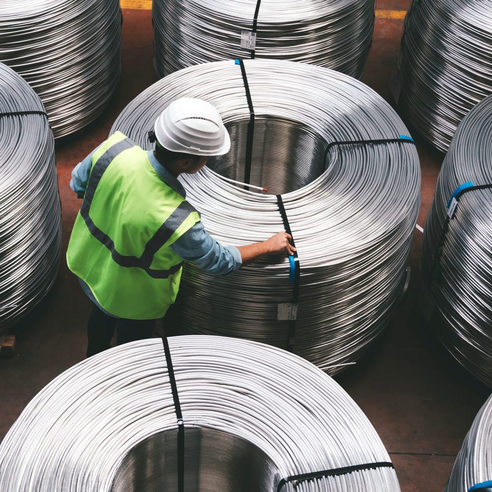 A digitalized cable manufacturing factory floor utilizing IIoT platforms to optimize processes.