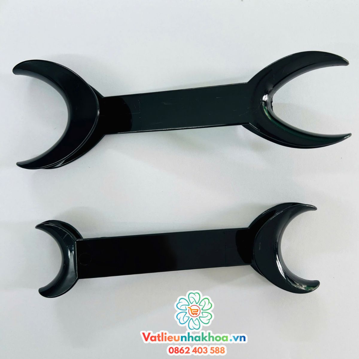 Banh miệng nhựa kéo 2 đầu đen