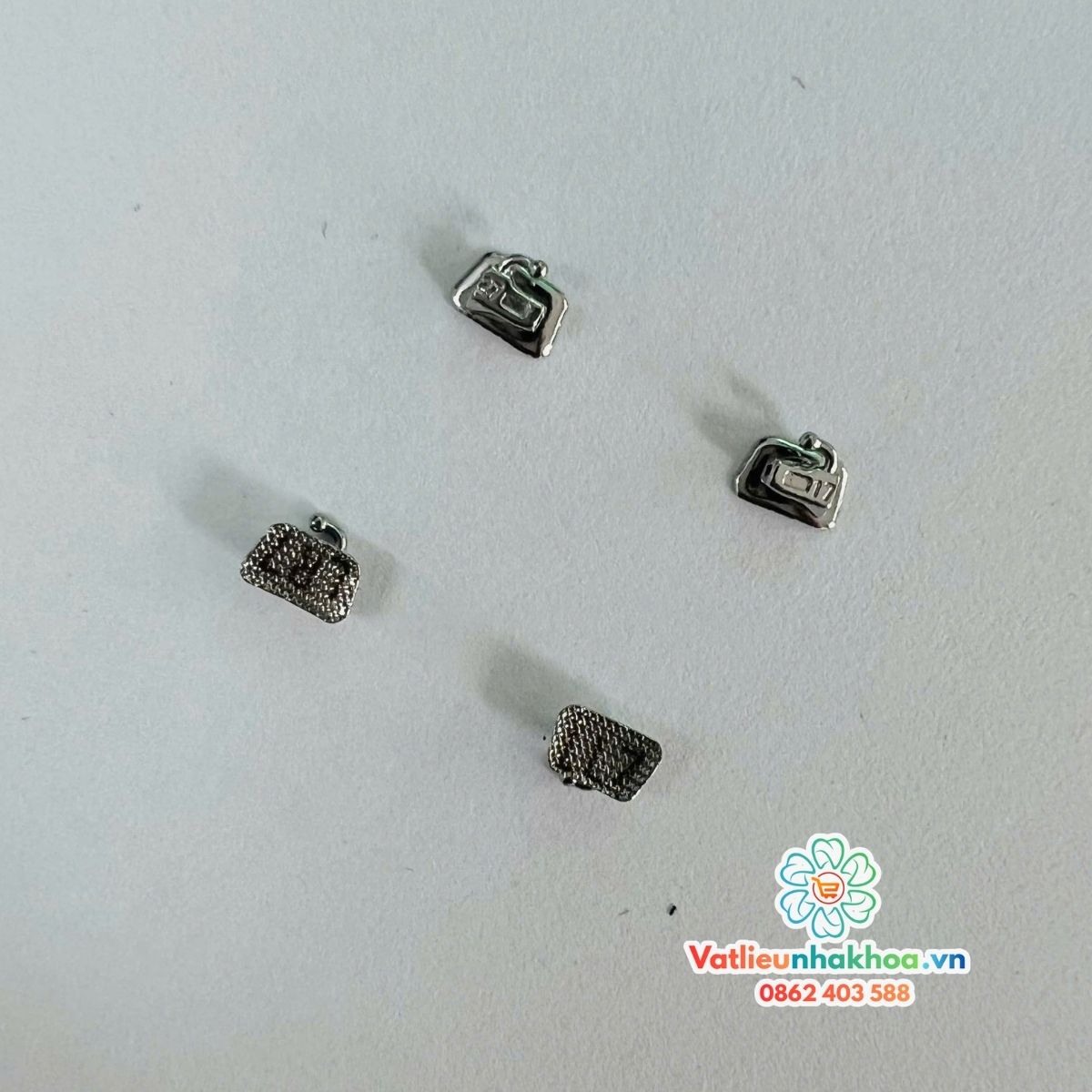 Mắc cài 1 ống răng 6, răng 7 - Khắc laze