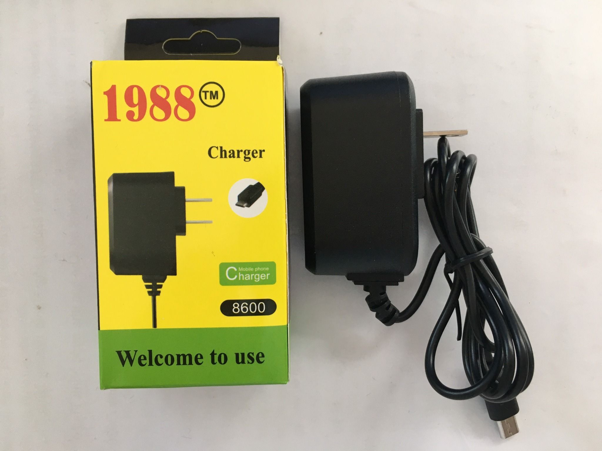 Cục Sạc micro dẹp 8600 TA-1988 chân dài cho vetu, Nokia, đt phím, loa, mic...
