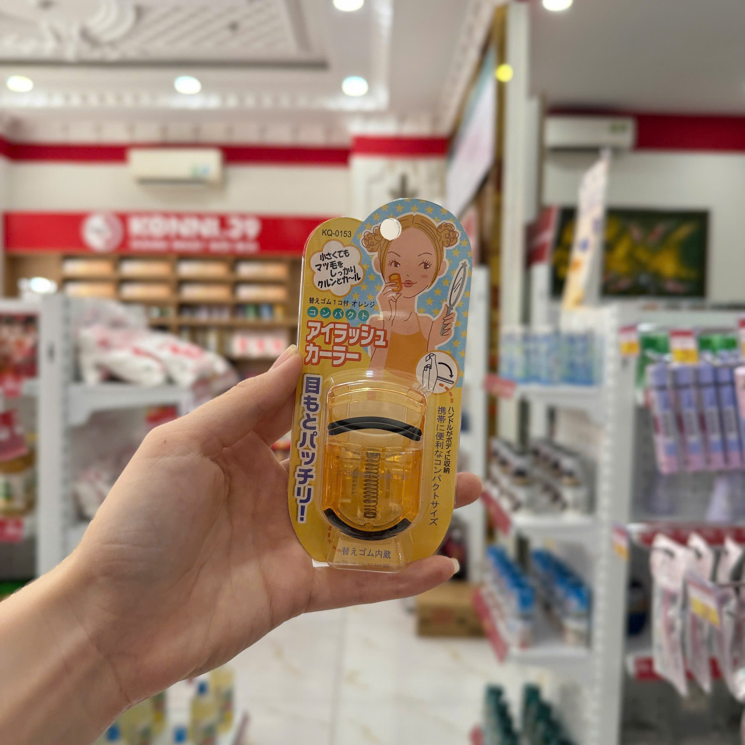 Kẹp mi Kai KQ-0152 thân nhựa - màu vàng