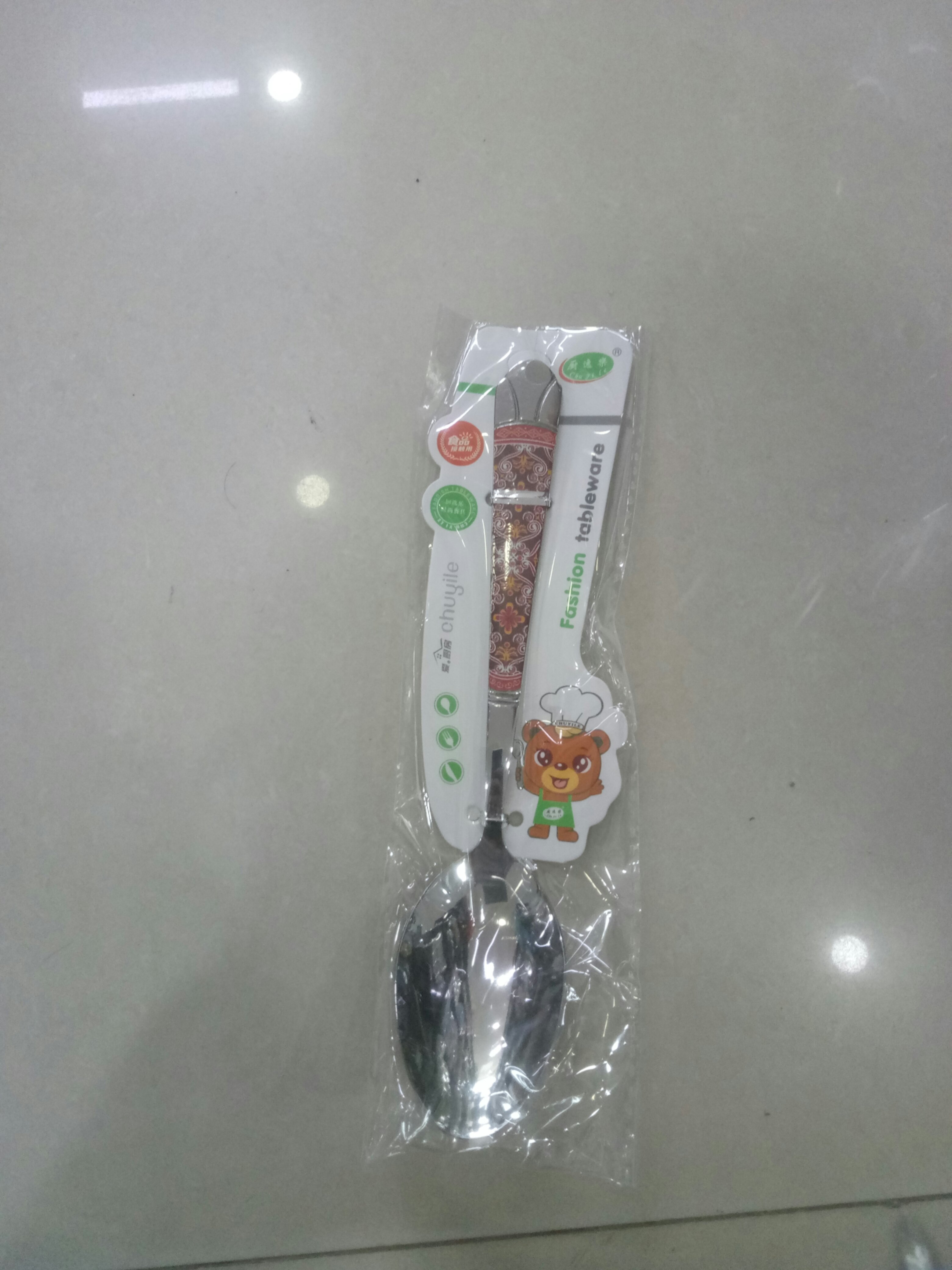 Thìa inox nhọn cán hoa văn 0681