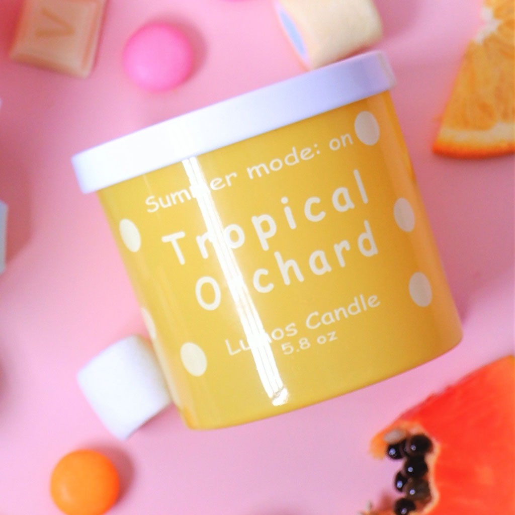 Nến thơm Lumos Tropical Qrchanrd  hương bưởi, chanh vàng, cam bergamot, chanh dây
