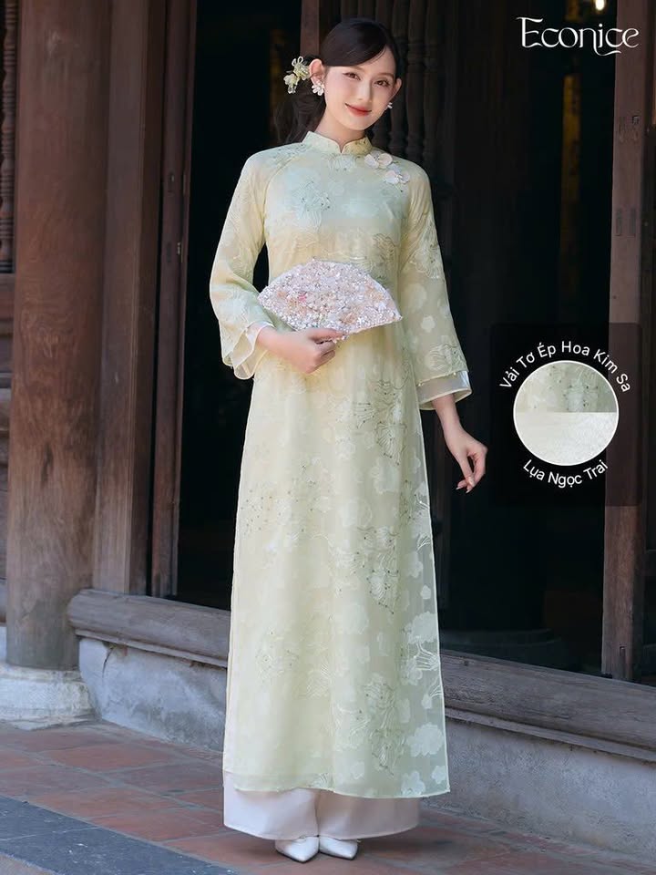 AD xanh lá cổ 3p thêu hoa lá tay xếp ly đính hoa vai