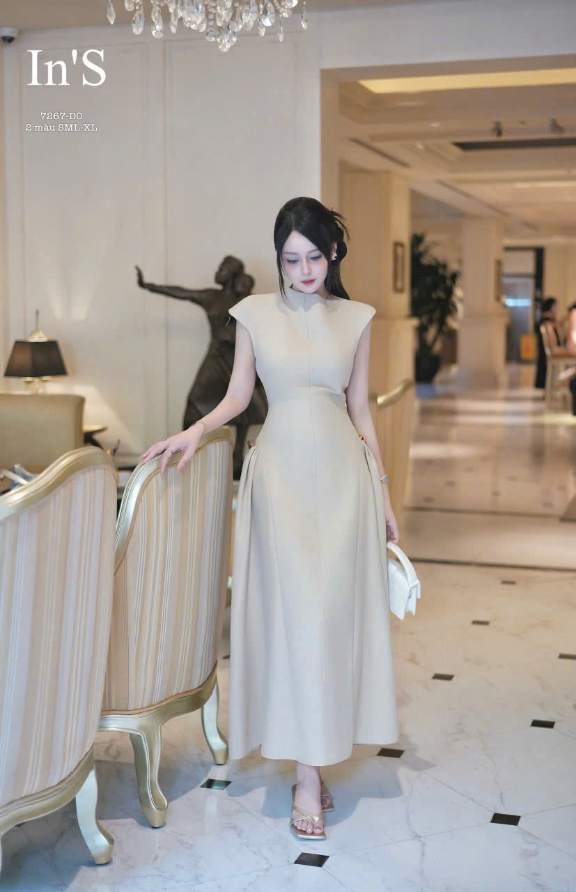 VT nâu cổ lệch đính tag vàng