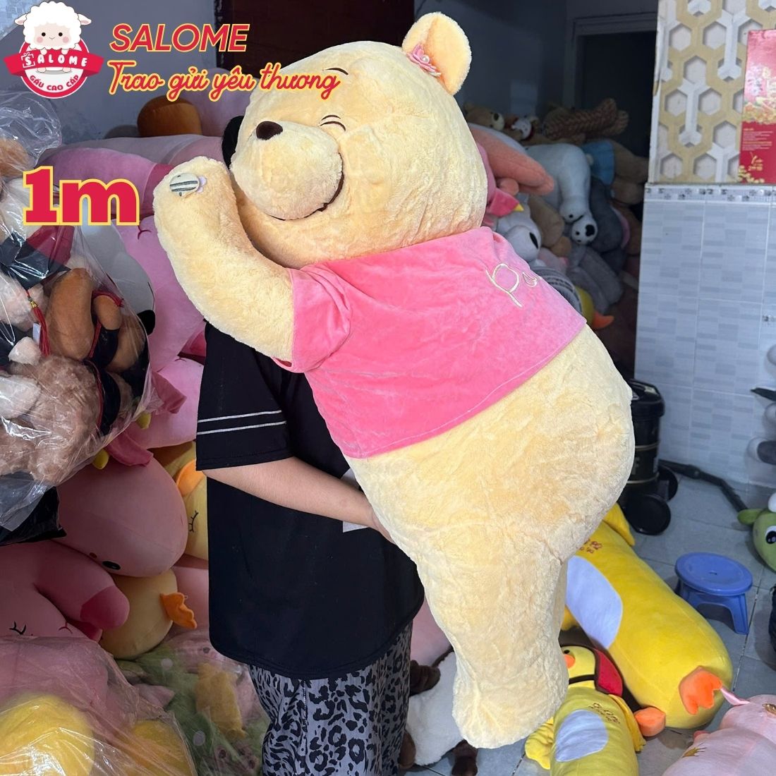 Thú bông gấu Pooh nằm áo chữ size 1 - 1m