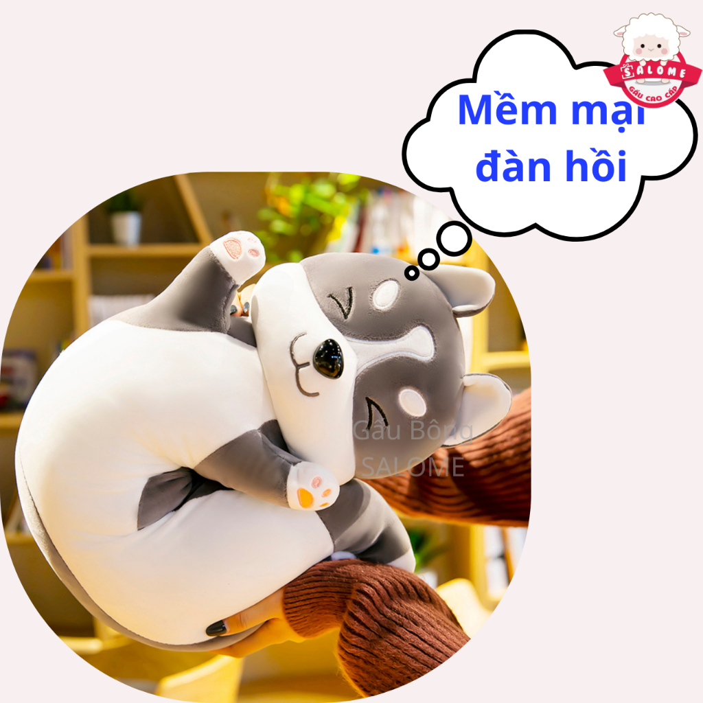 Gấu bông chó xám giơ tay