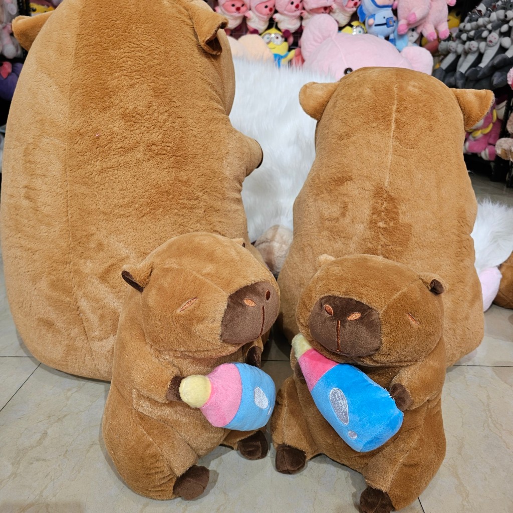 Gấu Bông  Capybara Cầm Bình Sữa