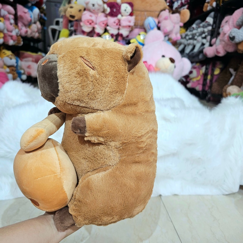 Gấu Bông Capybara Gõ Mõ
