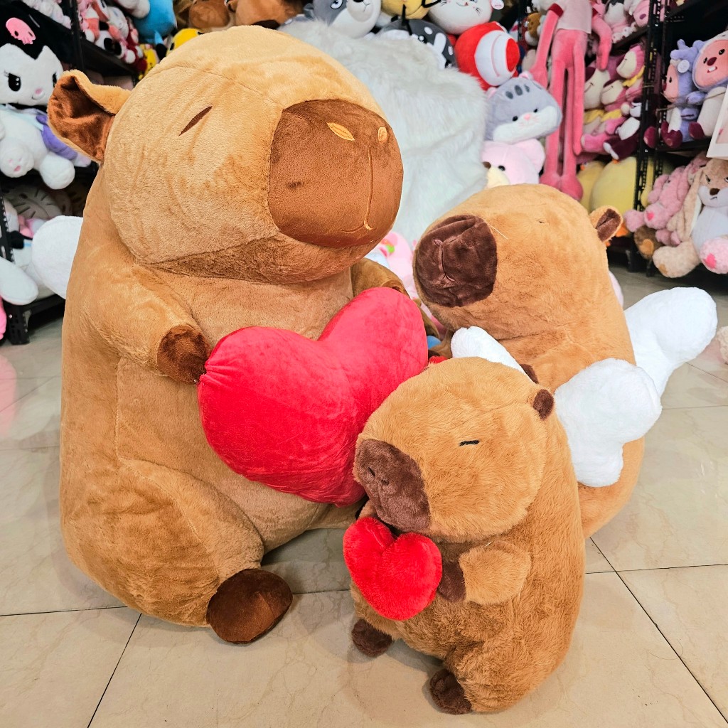Gấu Bông Capybara Ôm Tim Cánh Thiên Thần