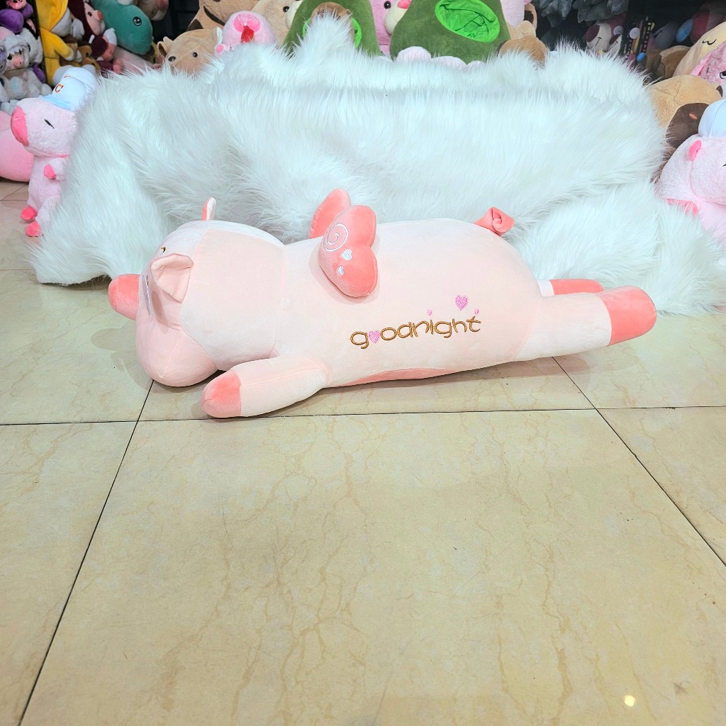 Gấu Bông Heo Cánh Tim