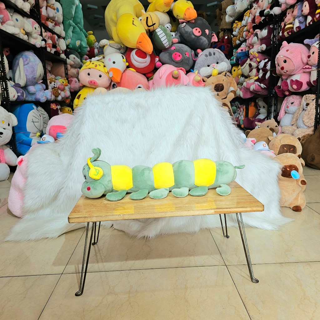 Gấu bông sâu đeo tai nghe