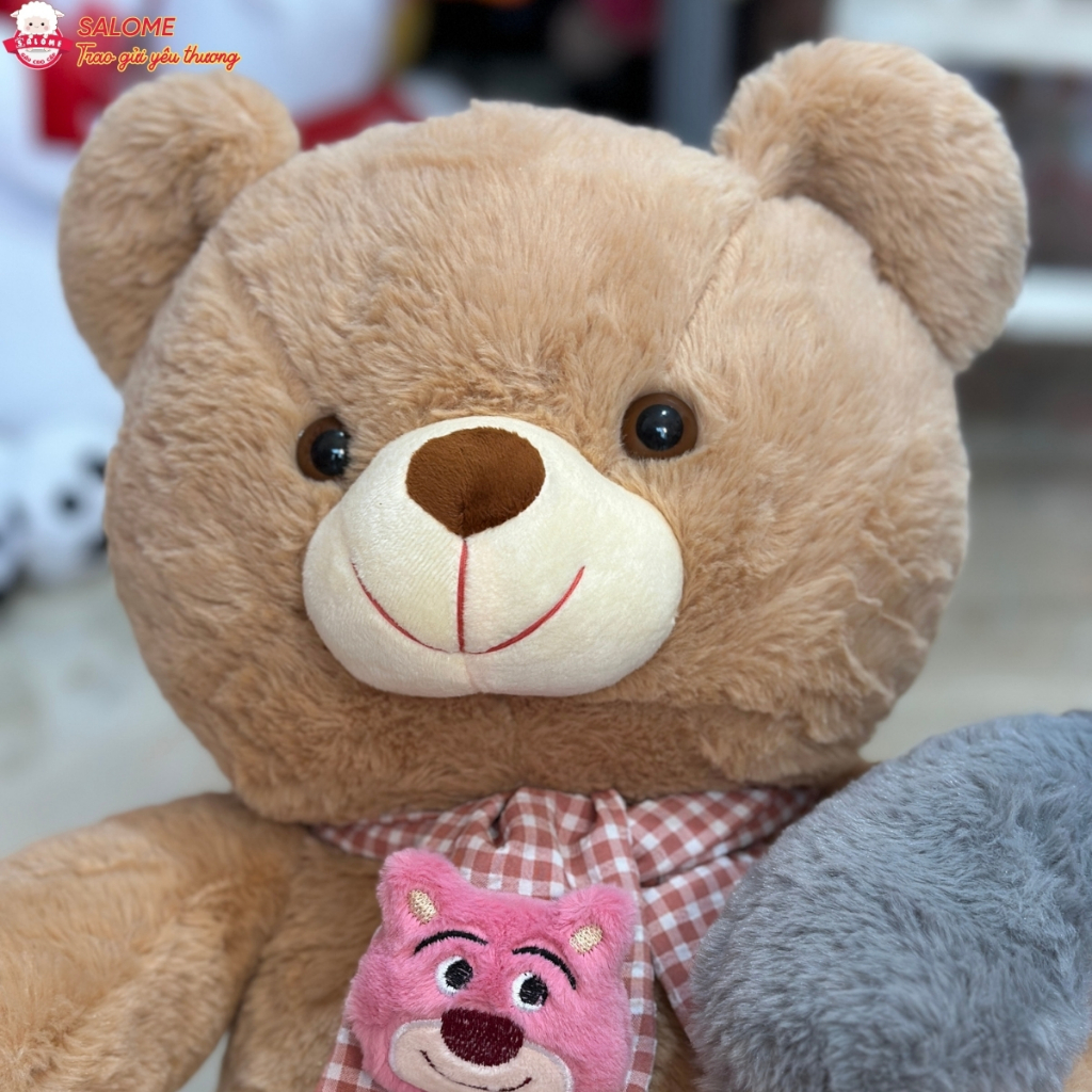 Gấu bông teddy quàng khăn