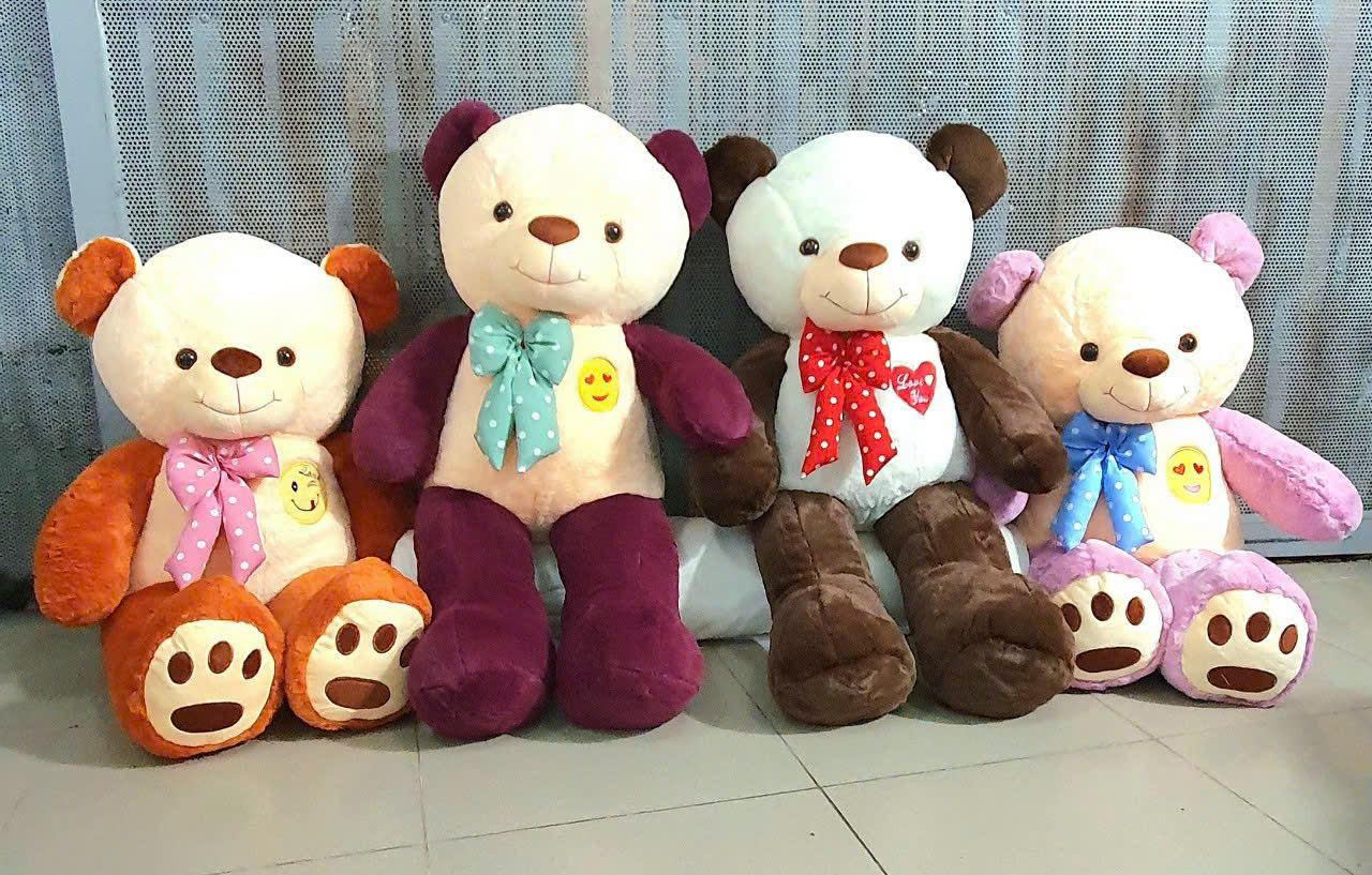 Gấu bông teddy mặt cười thắt nơ