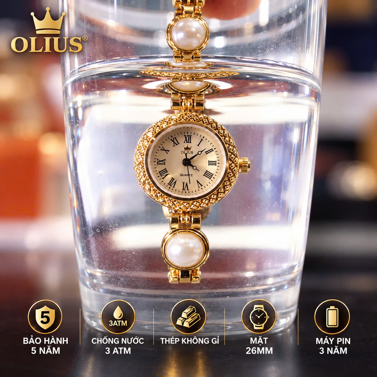 ĐỒNG HỒ NỮ OLIUS MẶT TRÒN 26MM – MẶT VÀNG – DÂY NGỌC TRAI TRẮNG – THÉP VÀNG HỒNG – MÁY QUARTZ