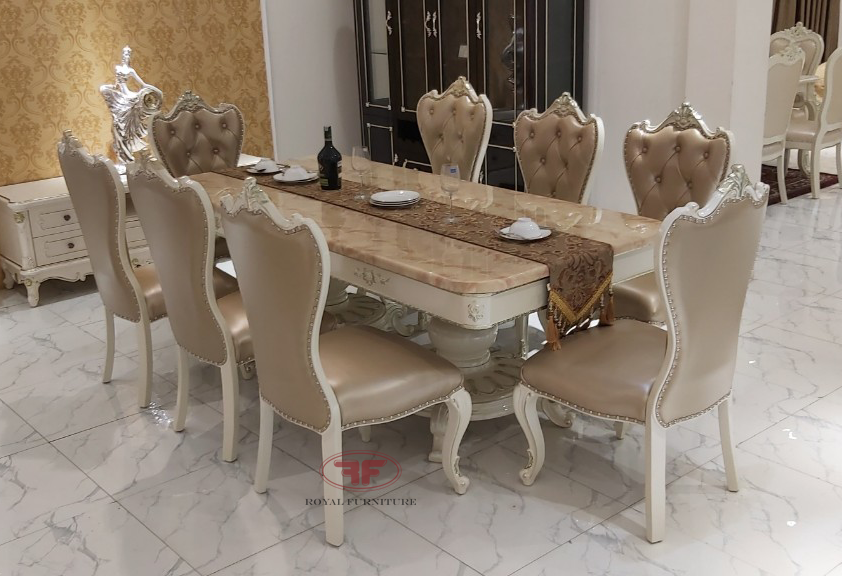Bộ bàn ăn mặt đá Tân cổ điển với 8 ghế sẽ mang đến cho căn phòng ăn của bạn một phong cách đầy thanh lịch và cổ điển. Màu sắc tối giản với mặt bàn đá sang trọng sẽ làm tôn lên không gian của gia đình bạn.