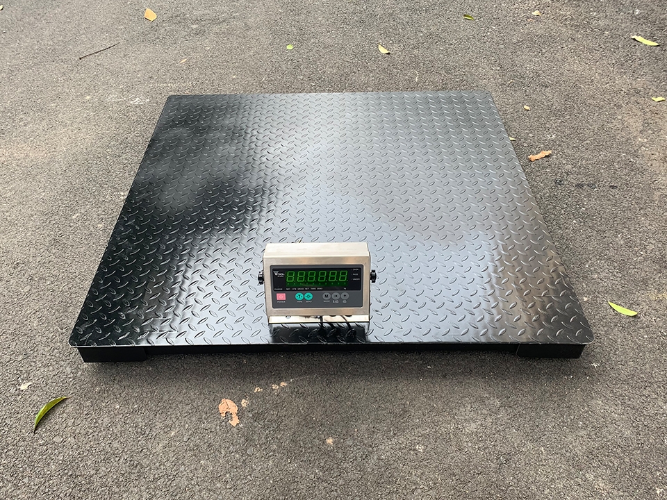 Vì sao bàn cân điện tử 2 tấn có cấu trúc khép kín?