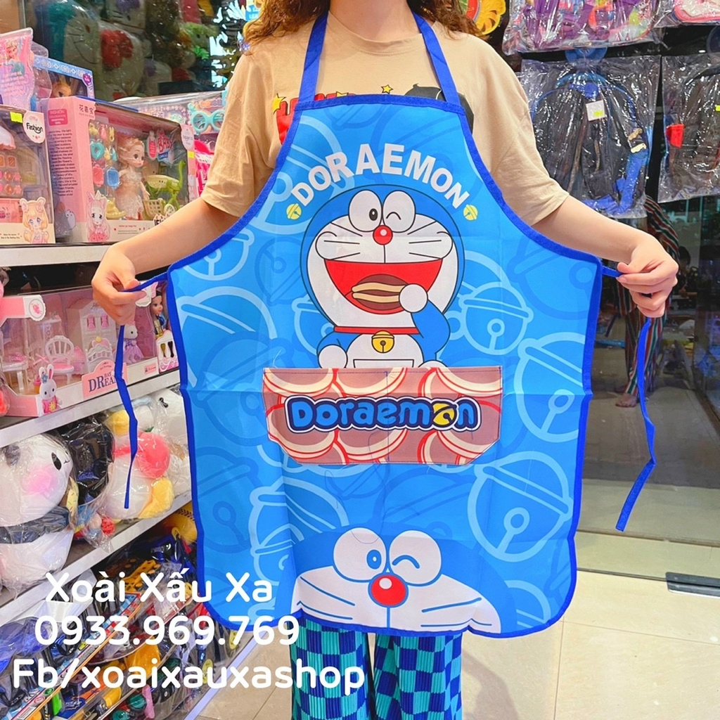 Tạp dề hoạt hình Doraemon là vật dụng không thể thiếu cho fan của Doraemon. Chiếc tạp dề với hình ảnh nhân vật hài hước này sẽ giúp bạn có trải nghiệm thú vị trong mỗi lần nấu ăn. Bạn sẽ cảm thấy được trẻ trung và vui tươi hơn khi sử dụng chiếc tạp dề này.