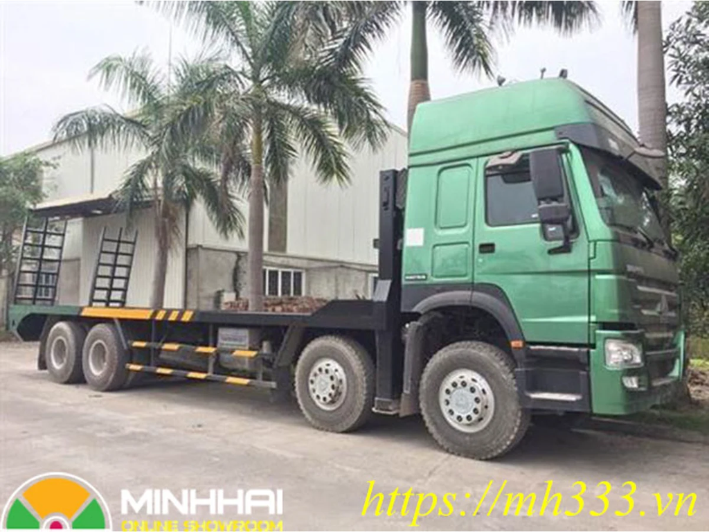Xe nâng đầu HOWO 4 chân 371HP màu xanh nhìn từ góc trước bên phải