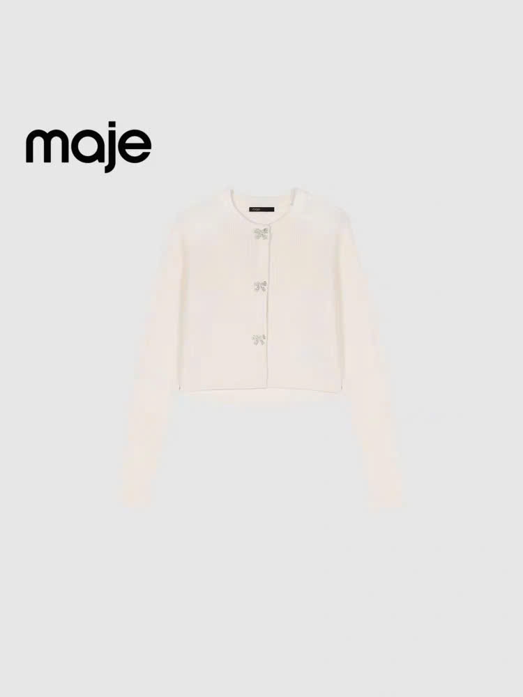 Cardigan len tăm khuy nơ đá dáng lửng