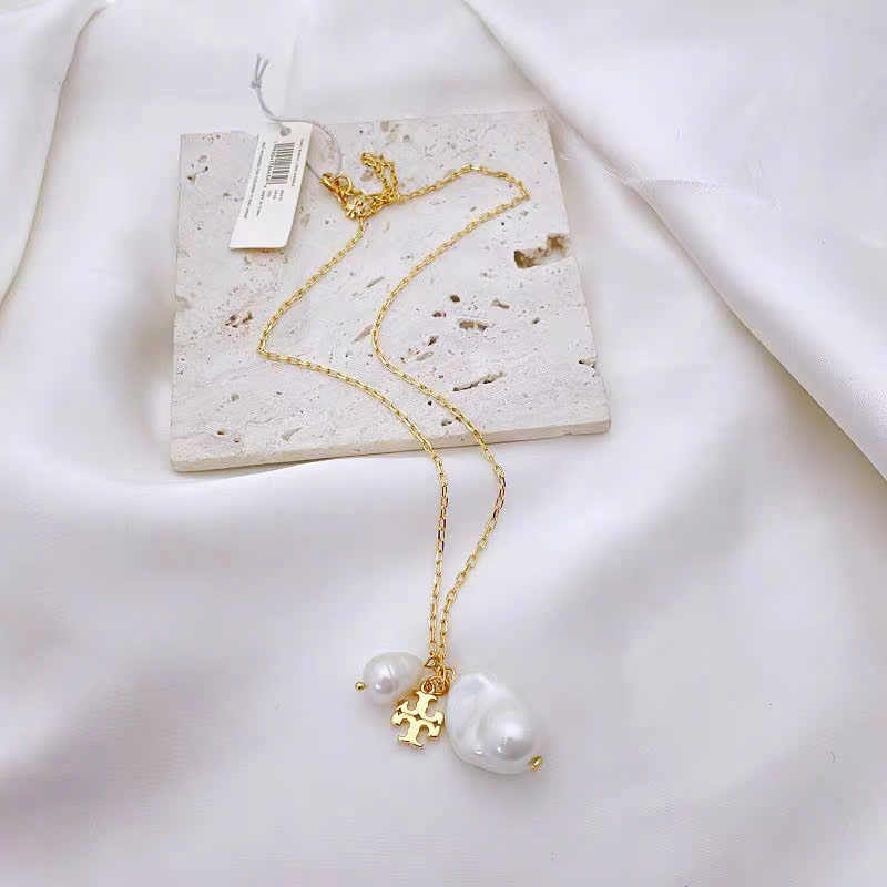 Dây chuyền Tory Burch ngọc trai kèm logo