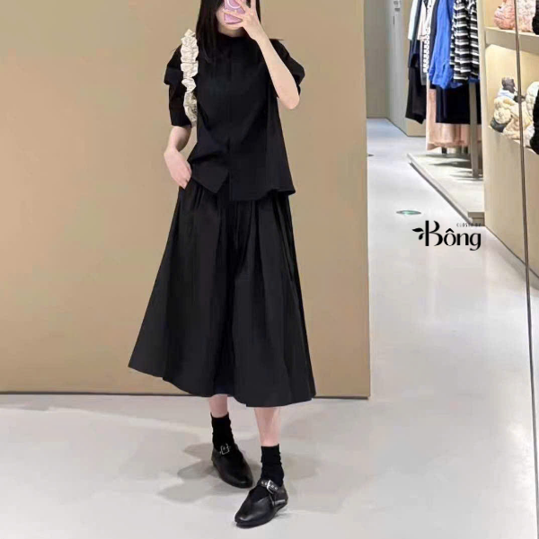Chân váy midi COS đen dư xịn túi 2 bên
