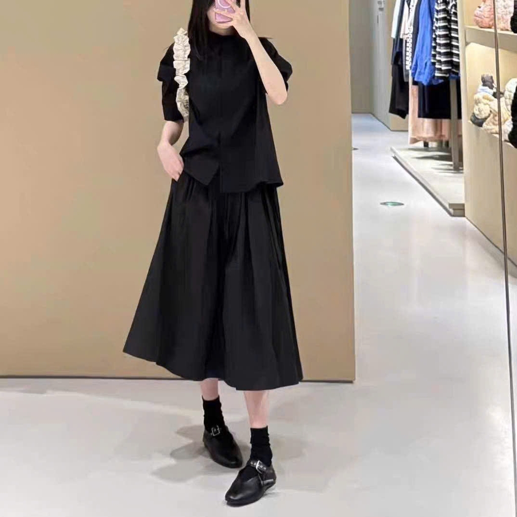 Chân váy midi COS đen dư xịn túi 2 bên