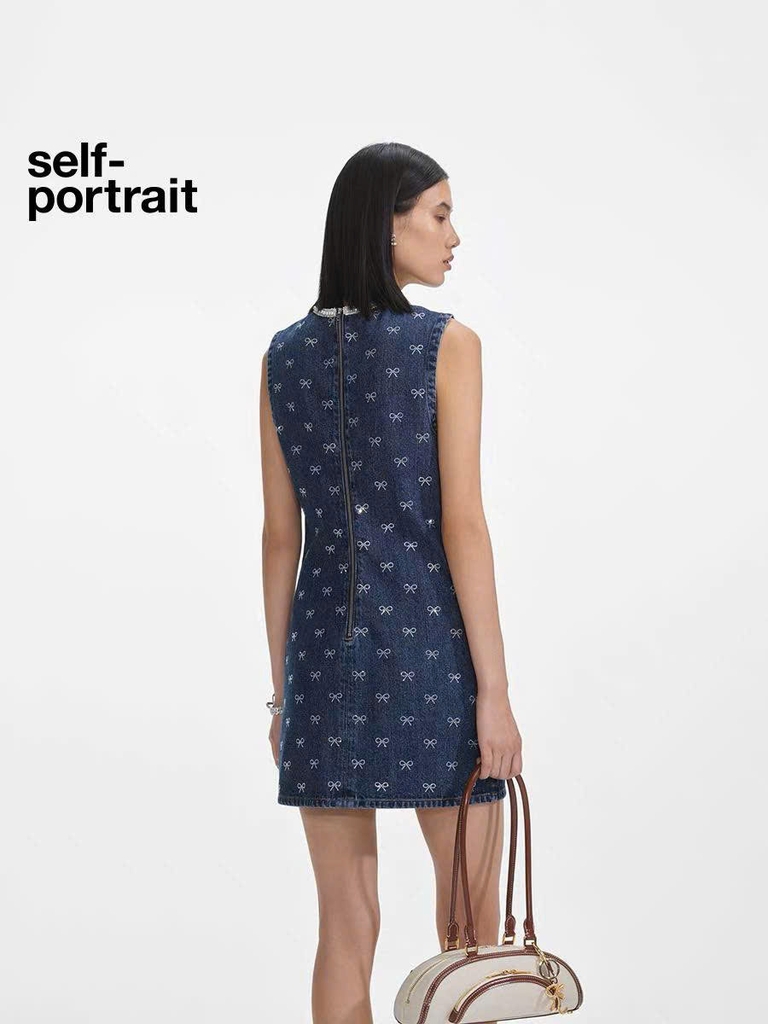 Váy denim Sel-Portrait sát nách đính hạt nơ dáng ngắn