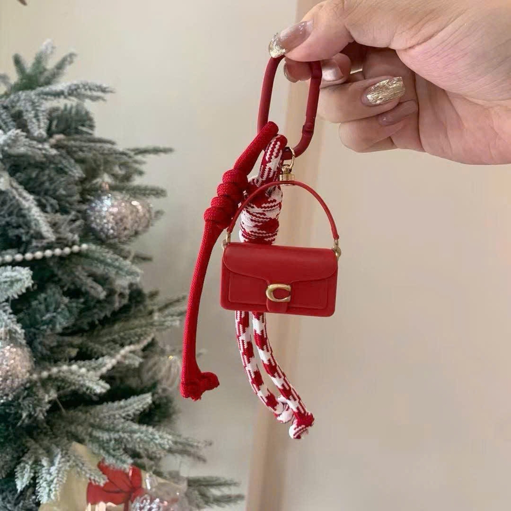 Charm COACH đỏ dư xịn fullbox