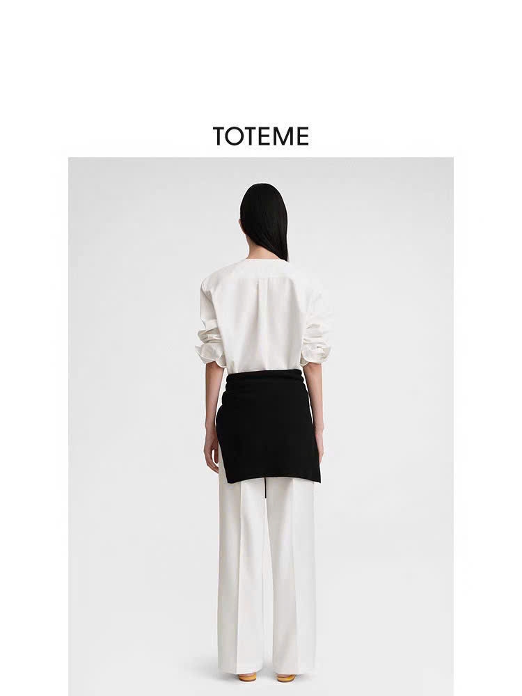 Sơ mi dáng loose cổ tròn khuy ngực