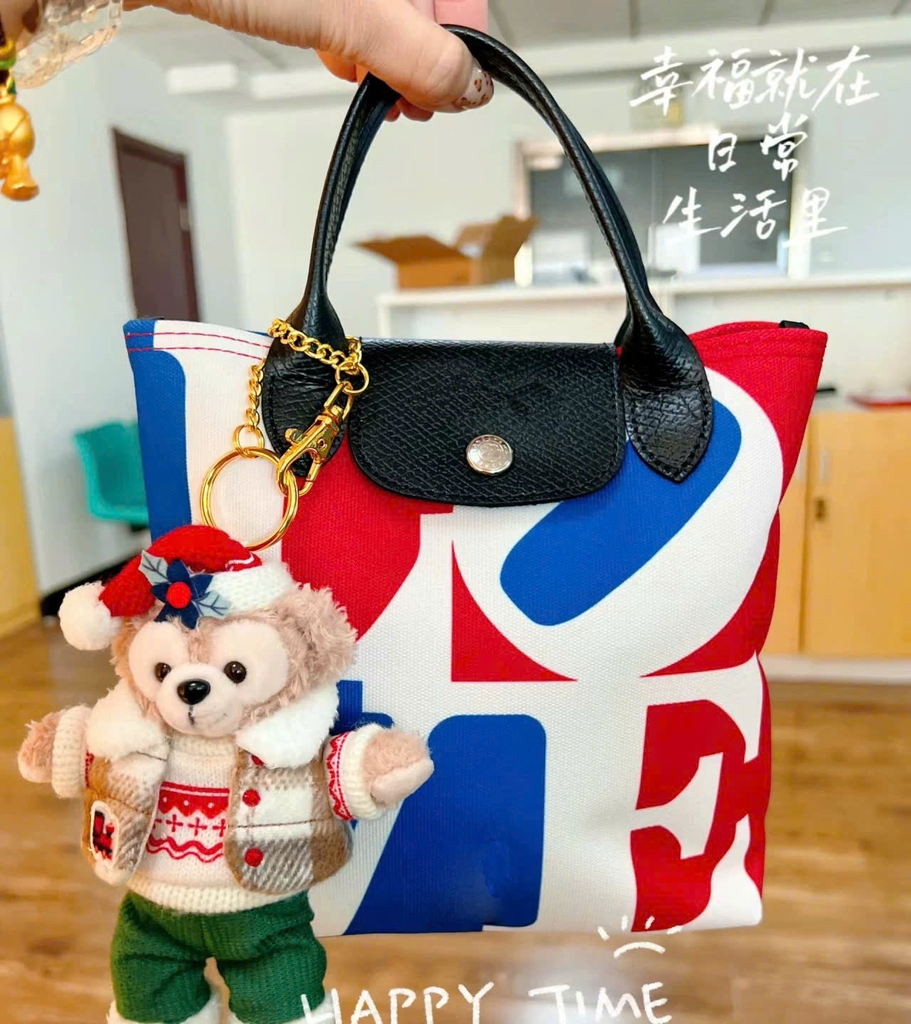 Túi Longchamps canvas series chữ LOVE