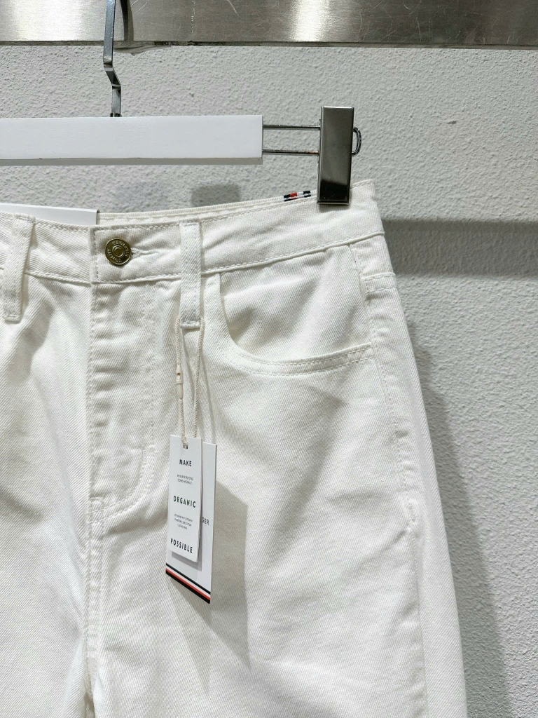 Quần baggy Tommy trắng rách gối dư xịn