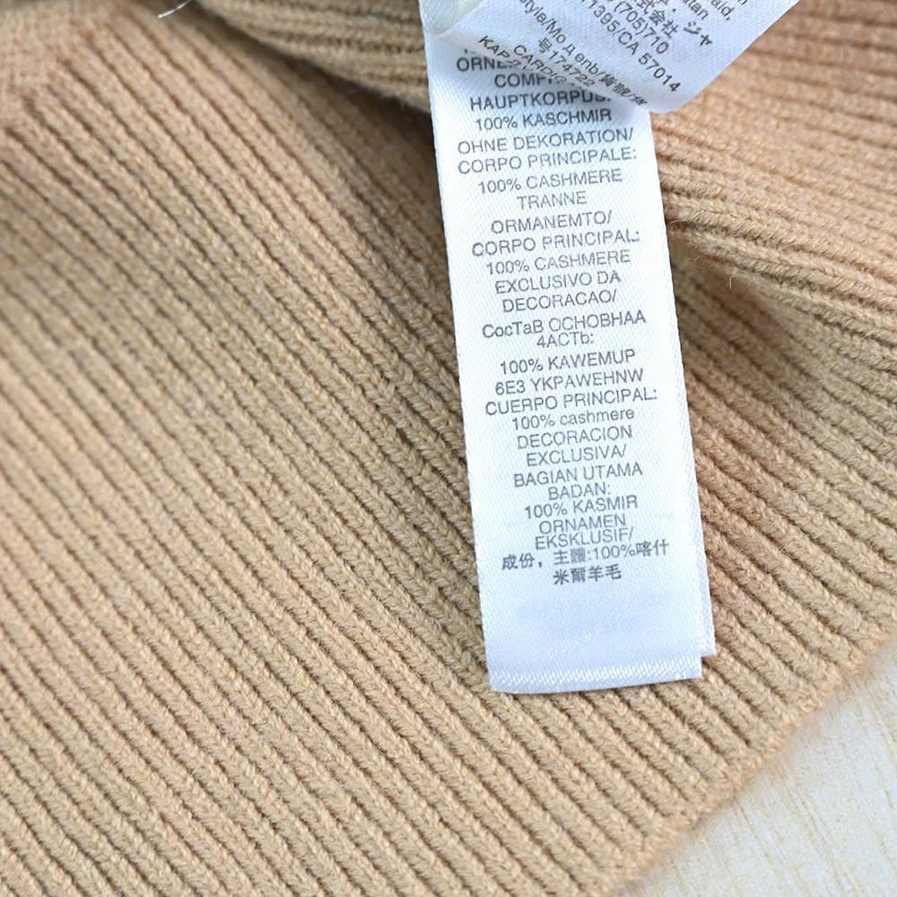 Áo len CDG Tory Burch thêu logo cổ V