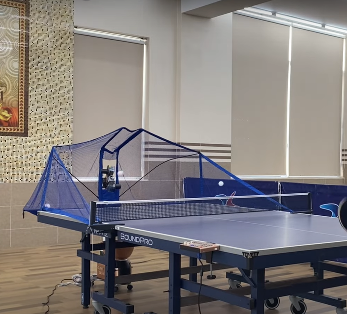 Máy bắn bóng bàn Oukei Q7 S