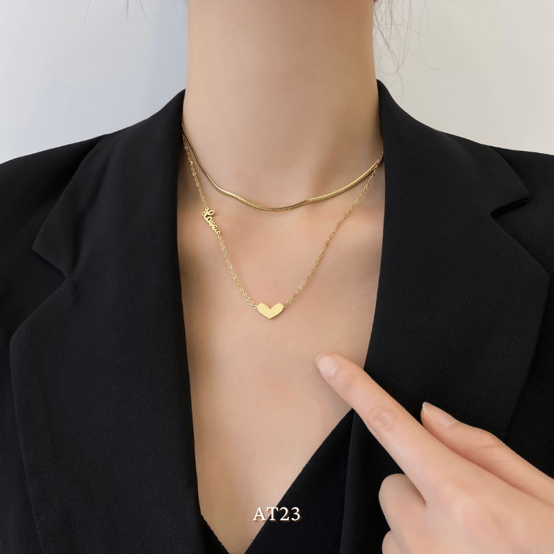 Dây chuyền titan không đen gỉ sợi đôi mặt tim mạ vàng nữ tính thanh lịch AT23
