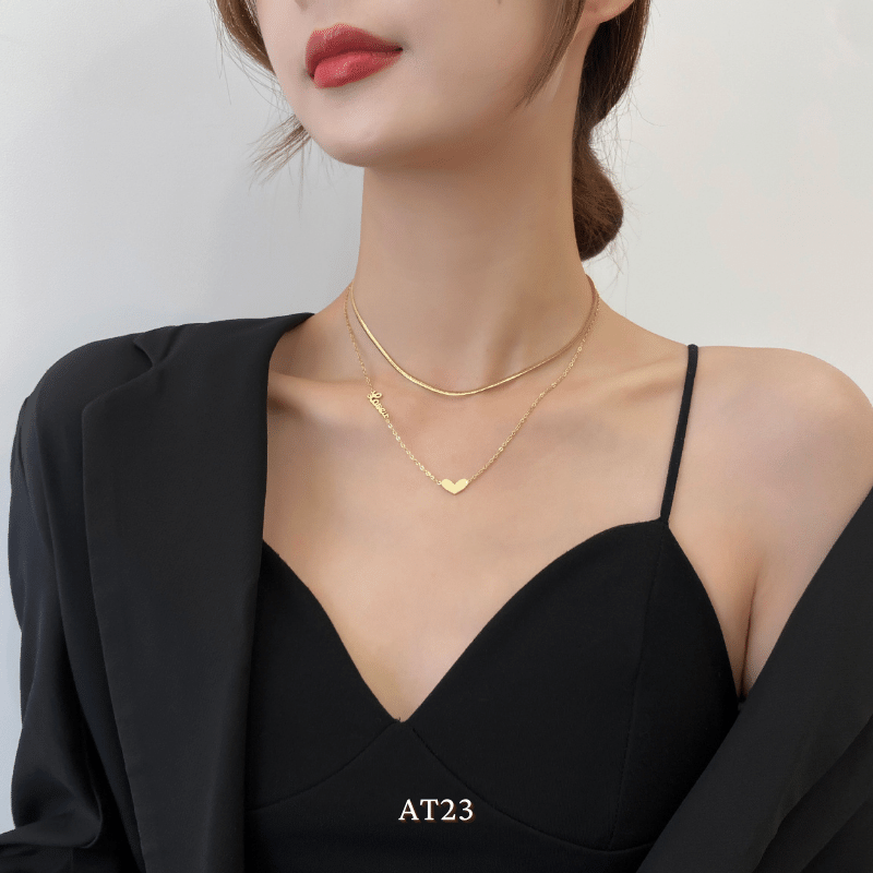 Dây chuyền titan không đen gỉ sợi đôi mặt tim mạ vàng nữ tính thanh lịch AT23