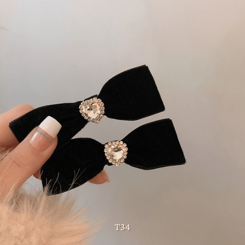 Kẹp tóc nơ hình tim đính đá dễ thương Mely T34