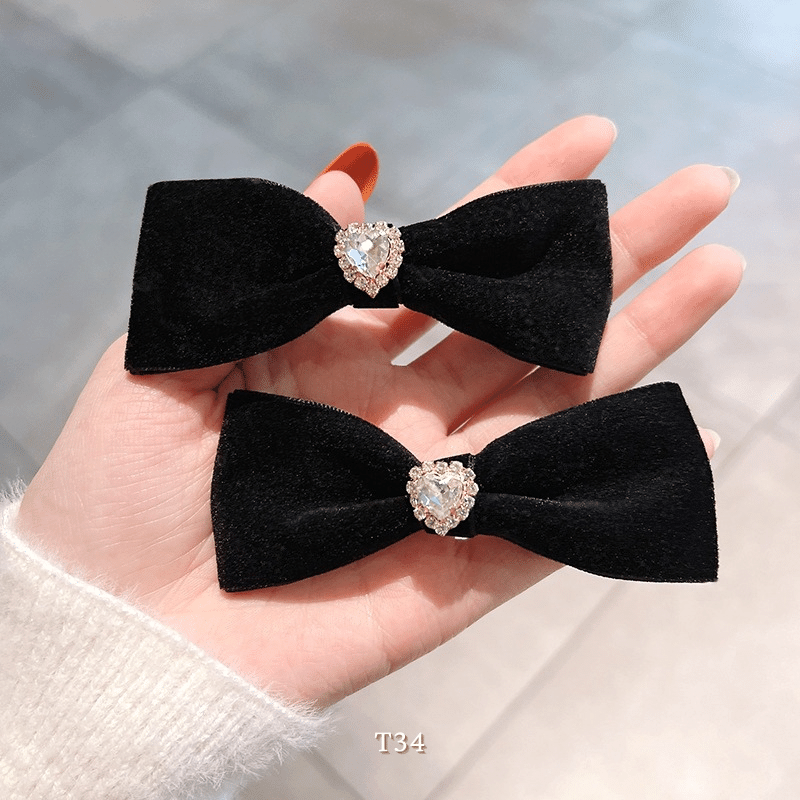 Kẹp tóc nơ hình tim đính đá dễ thương Mely T34