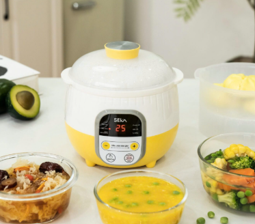 Nồi nấu cháo chậm Seka SK6132 màu vàng (kèm lồng hấp)