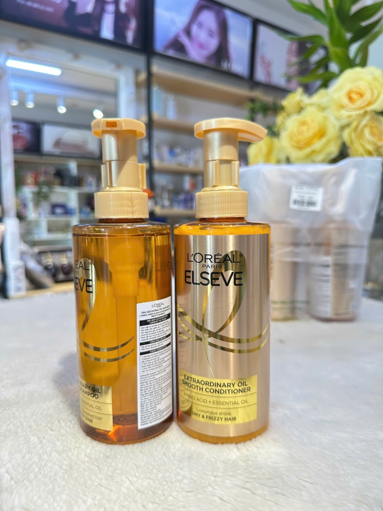 Bộ Dầu Gội Xả Phục Hồi, Giảm Gãy Rụng Loreal Paris Extraordinary Oil Smooth 440ml*2 (Hàng Công Ty )