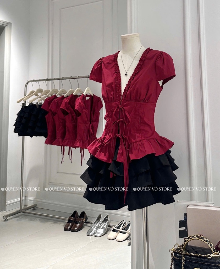 Set áo đỏ cổ V chân váy đen tầng