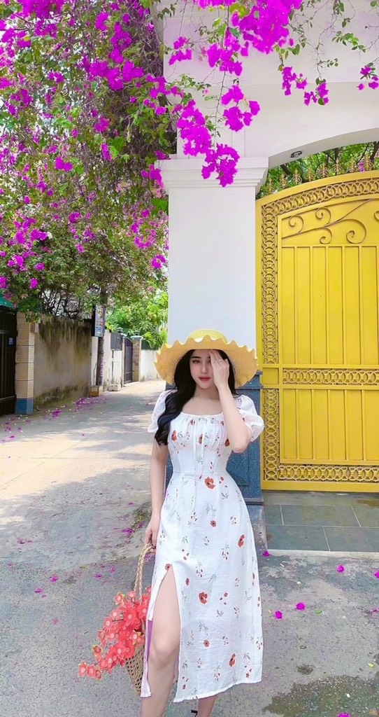 Đầm maxi hoa vàng xẻ tà