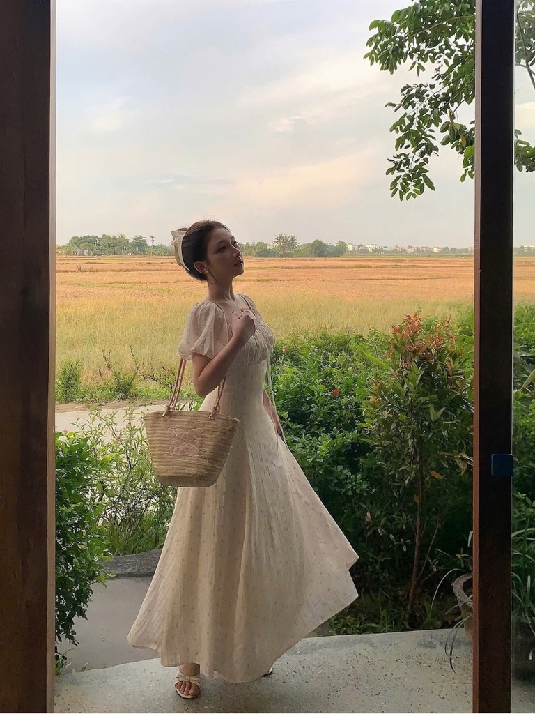 Đầm hoa nhí nơ ngực tay bồng