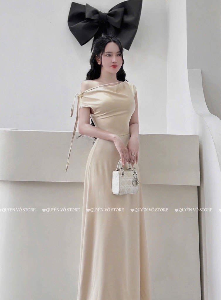 Đầm lụa lệch vai tag bướm - Kem
