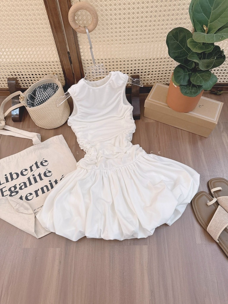 Đầm trắng nhún xòe tùng bí