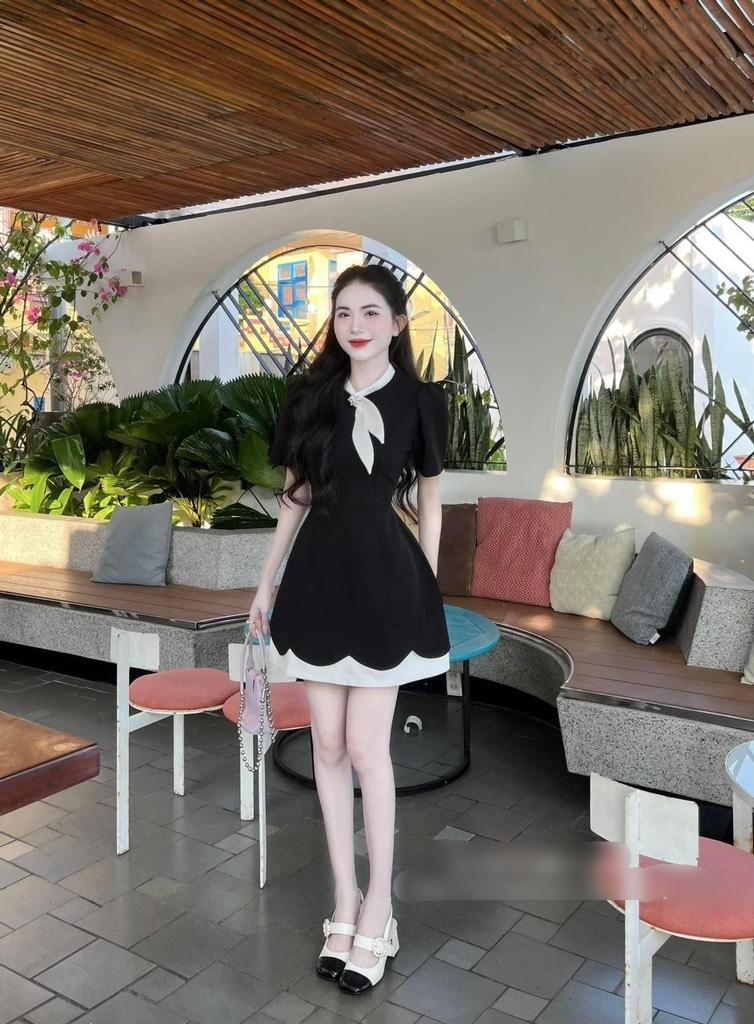 Đầm cách điệu nơ cổ