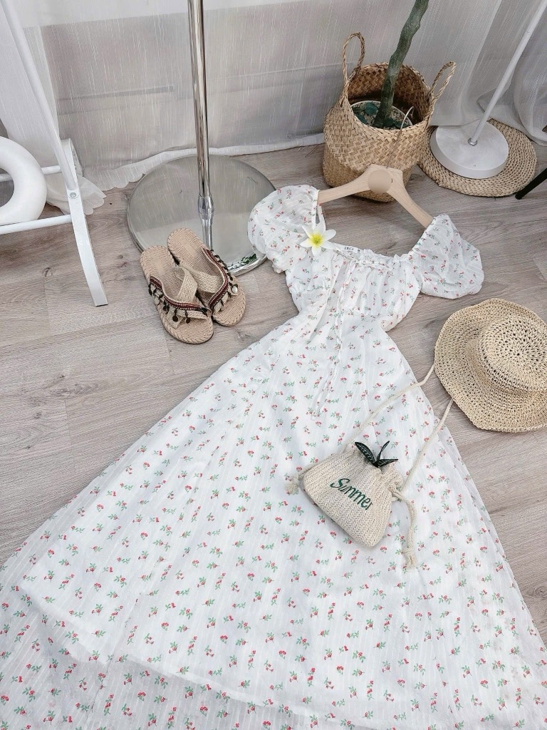 Đầm hoa nhí nơ ngực tay bồng