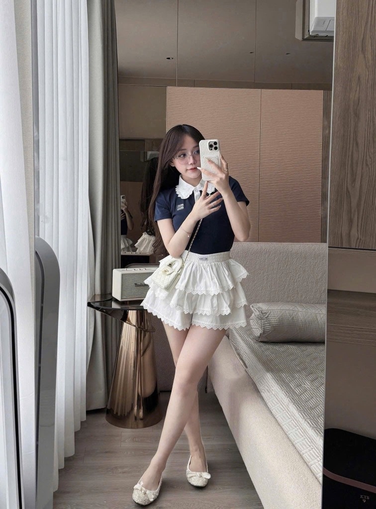 Set áo cổ polo chân váy tầng xòe - Đen