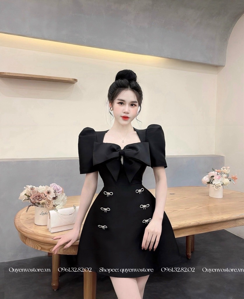 Đầm tafta nơ ngực kèm nơ đá